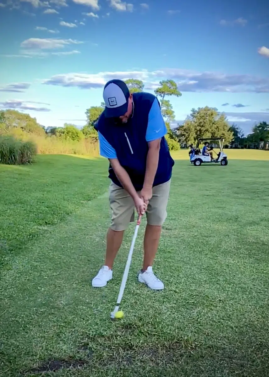 PGA Professional Brendon Elliott demonstrates a good impact position to stop topping the ball