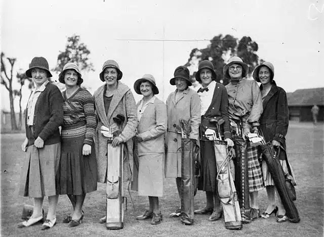 women golfers wearing hats